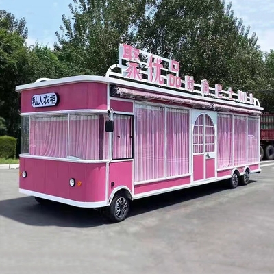 Trailers eléctricos móviles de ropa para hombres, mujeres y niños en bebidas